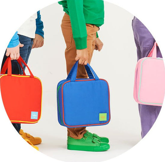 Photo of kids carrying Keke bags