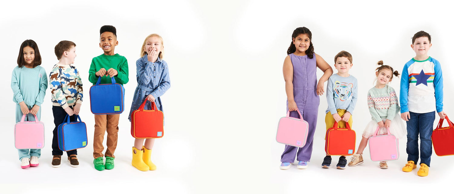 Lineup of kids posing with Keke bags